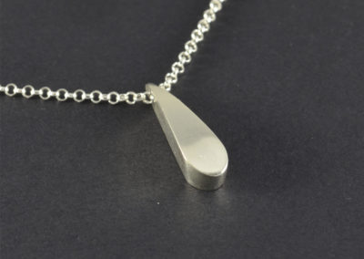 Silver pendant. Unique tear drop shape necklace. Simple contemporary style. Sterling silver chain. Contemporary jewellery. Sterling elegant.