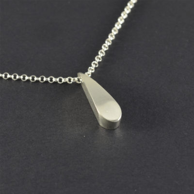 Silver pendant. Unique tear drop shape necklace. Simple contemporary style. Sterling silver chain. Contemporary jewellery. Sterling elegant.