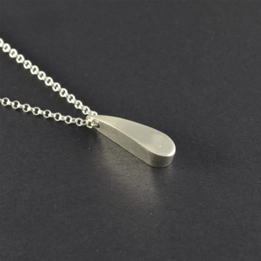 Silver pendant. Unique tear drop shape necklace. Simple contemporary style. Sterling silver chain. Contemporary jewellery. Sterling elegant.